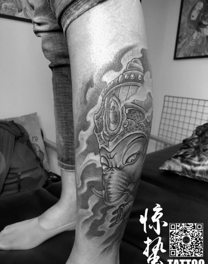 象神纹身图片_成品腿部传统鬼神纹身图案