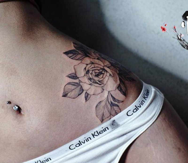 腰間花纹身图片_腰部原创纹身图案