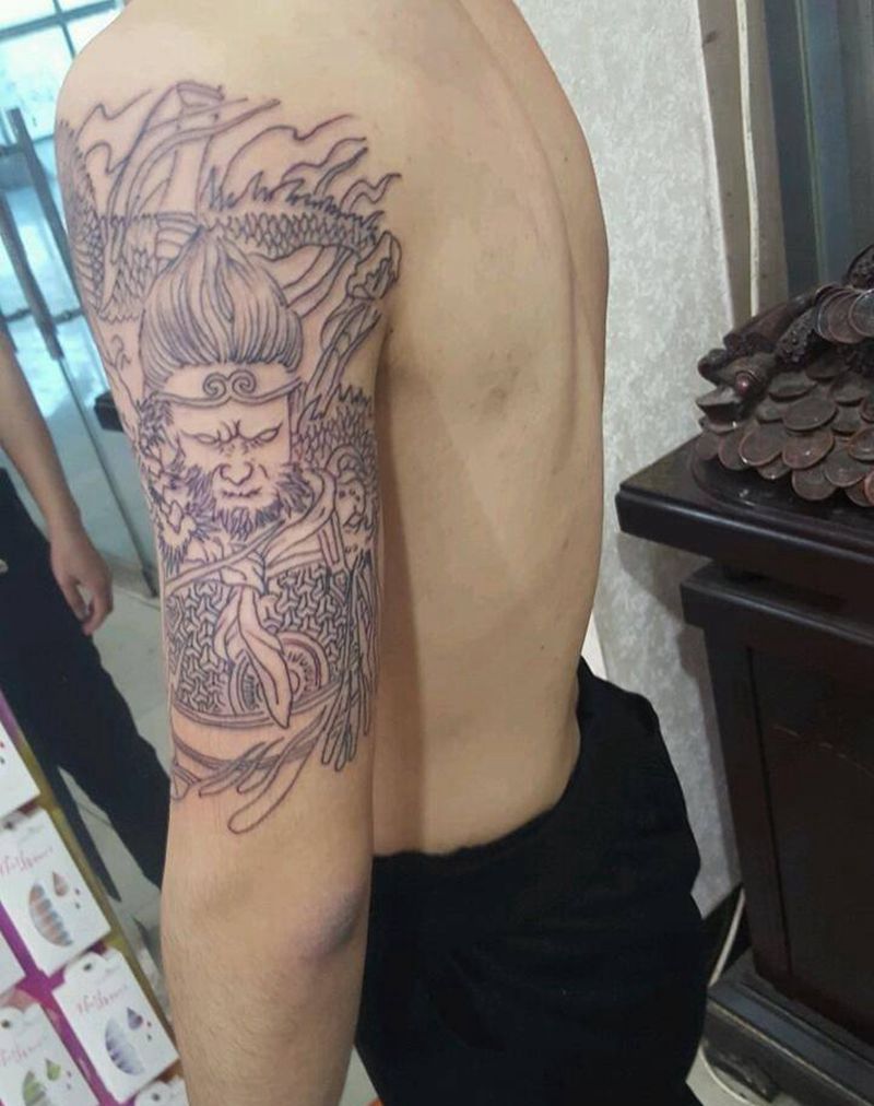 斗战胜佛大臂外侧线条纹身图片