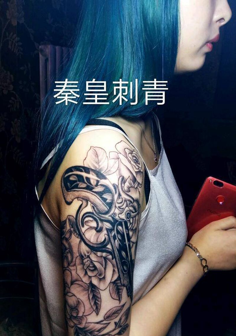 枪花纹身图片