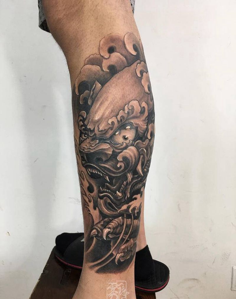 福狮纹身图片_腿部新传统纹身图案