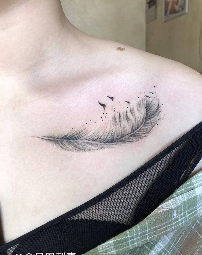羽毛纹身图片_胸部纹身图案