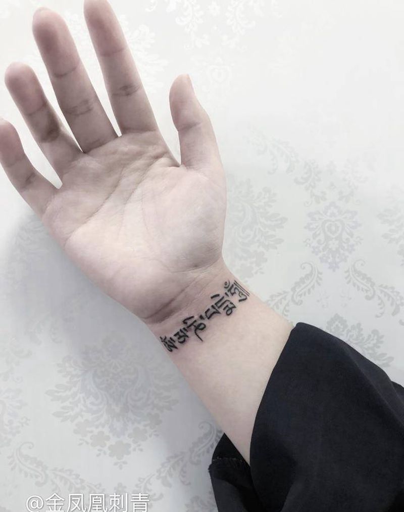 六字真言纹身图片_手臂纹身图案