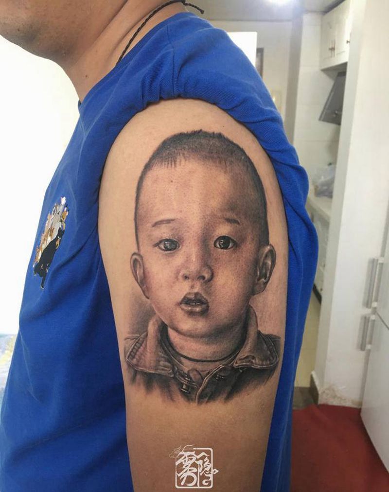 宝贝纹身图片_手臂欧美写实肖像纹身图案