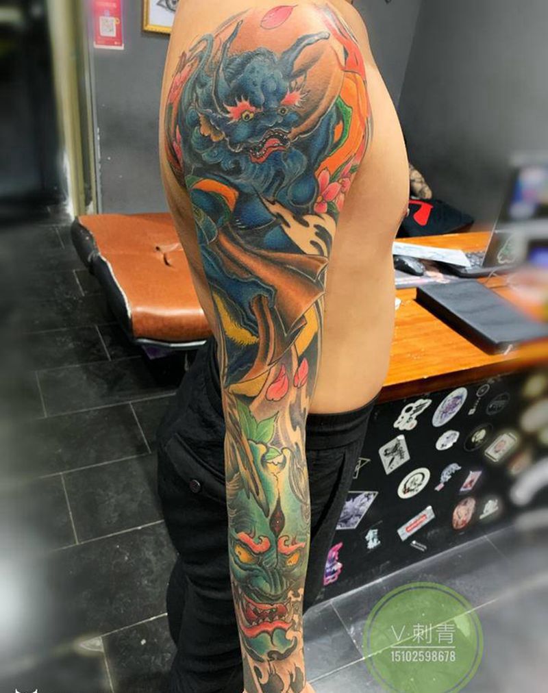 花臂纹身图片_手臂新传统纹身图案