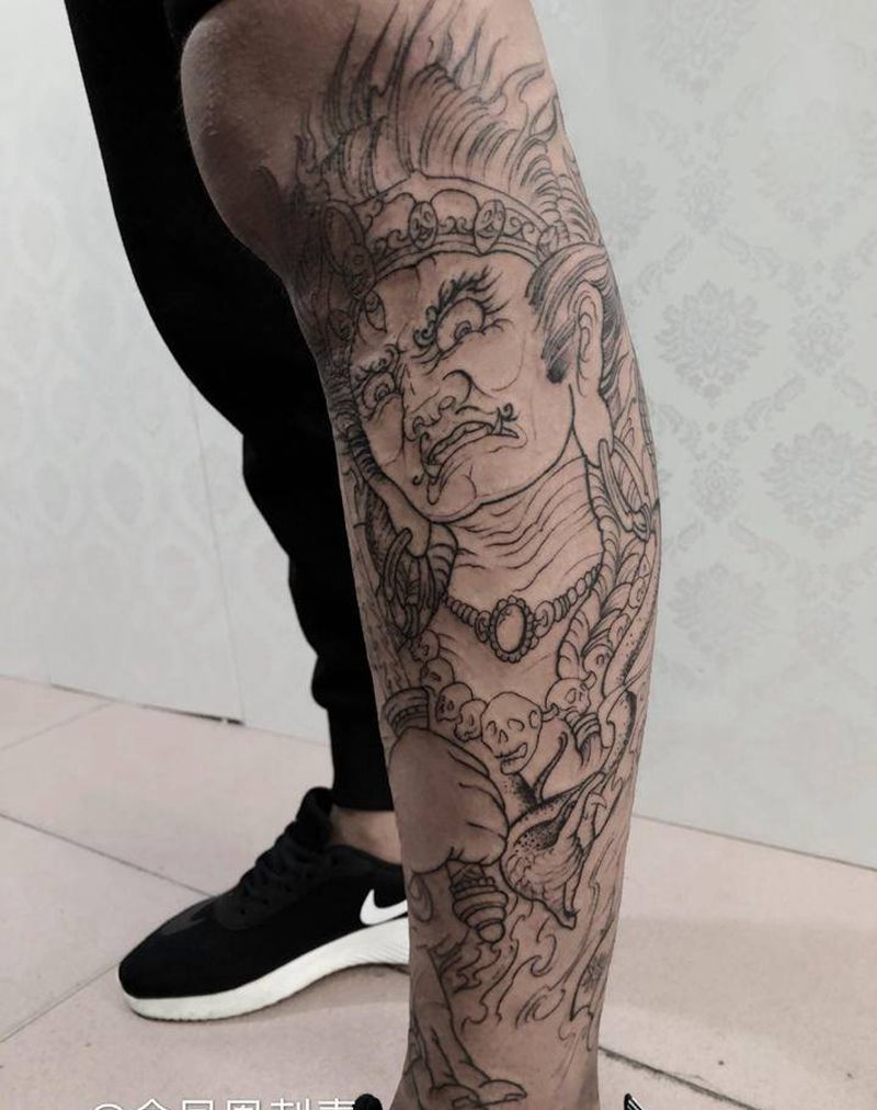 大黑天线条纹身图片_腿部纹身图案