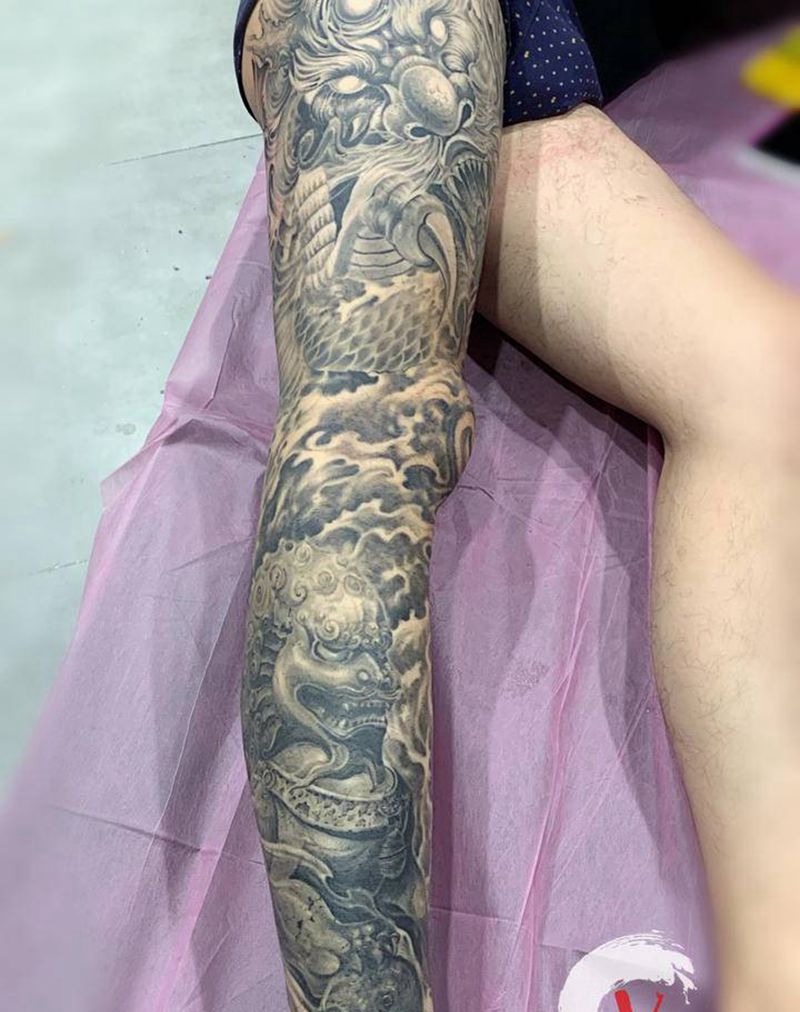 龙游华夏纹身图片_腿部新传统欧美写实纹身图案