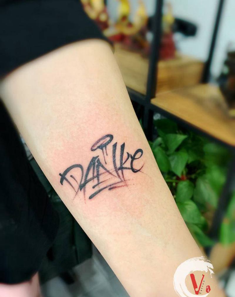 字母纹身图片_手臂图腾花体字纹身图案