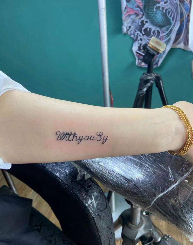 字母纹身图片_手臂花体字纹身图案