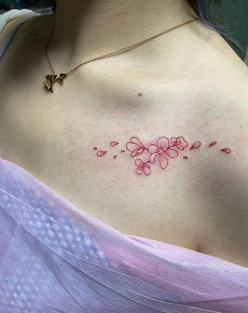 花花纹身图片_胸部点刺水彩纹身图案