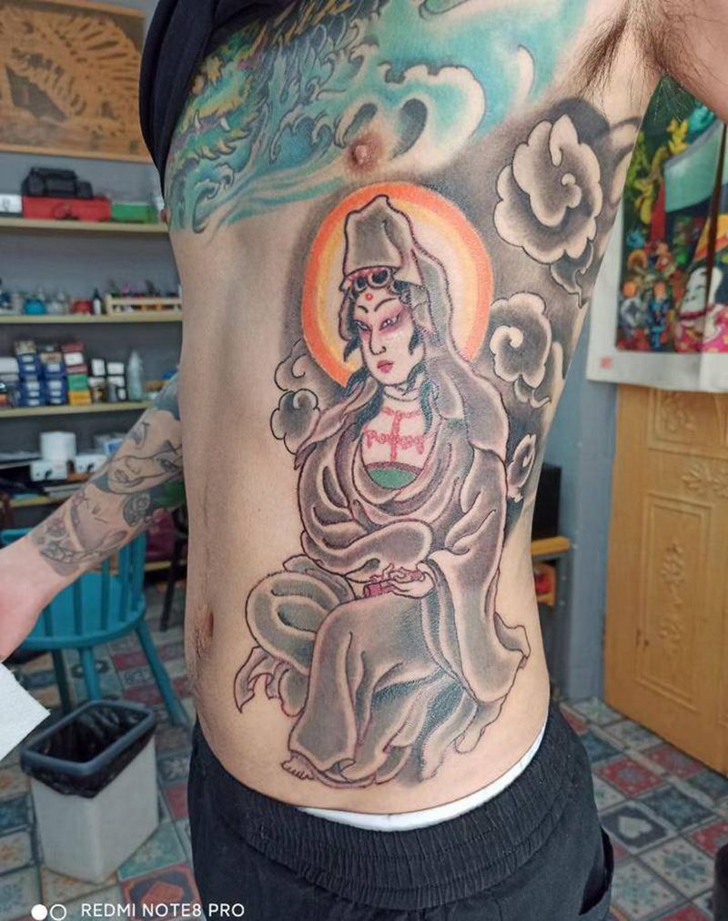 观音纹身图片_腰部老传统纹身图案