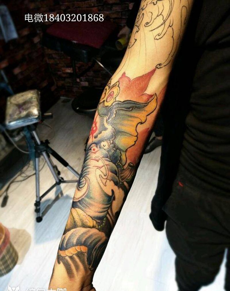 深色象神纹身图片_手臂传统鬼神成品纹身图案