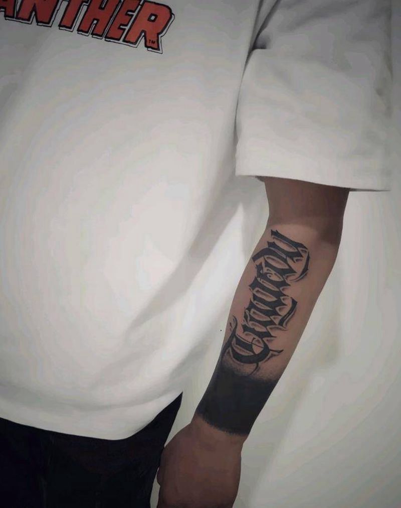 花体字纹身图片_手臂纹身图案