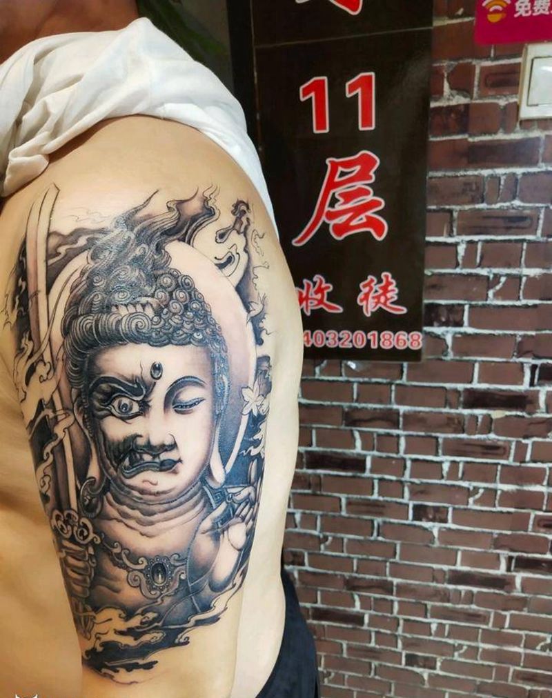 佛不动明王合体纹身图片_手臂新传统佛头纹身图案