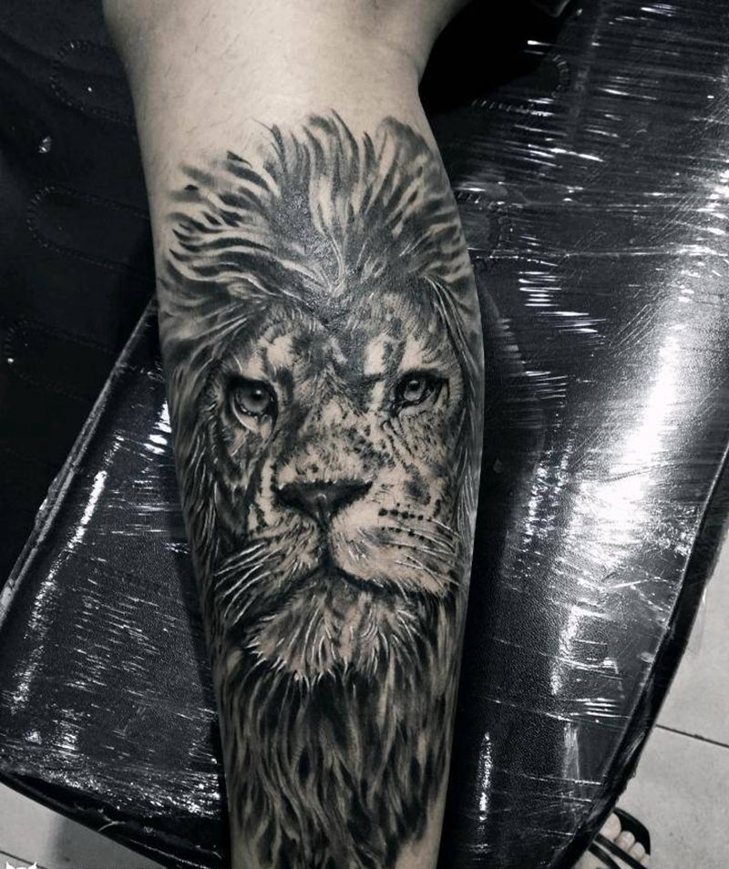 狮子纹身图片_腿部欧美写实纹身图案