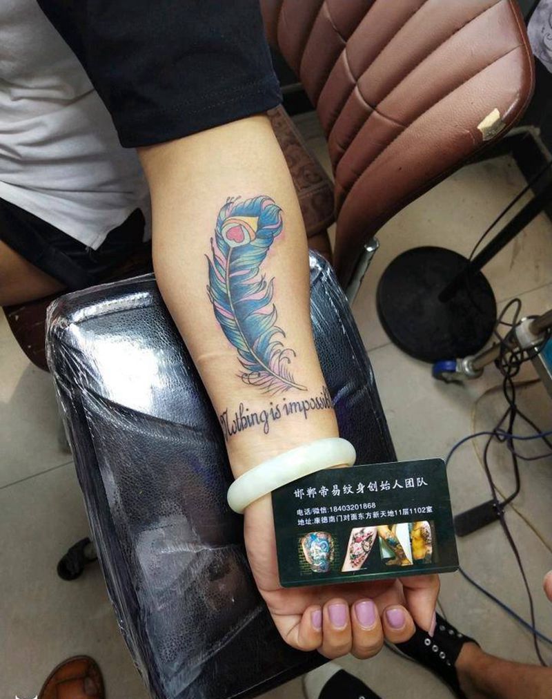 鸡毛纹身图片_手臂清新静物成品纹身图案