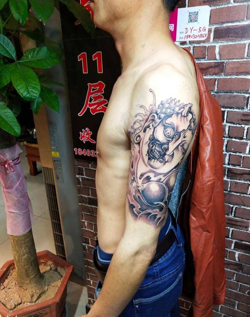 佛魔纹身图片_手臂新传统佛头纹身图案