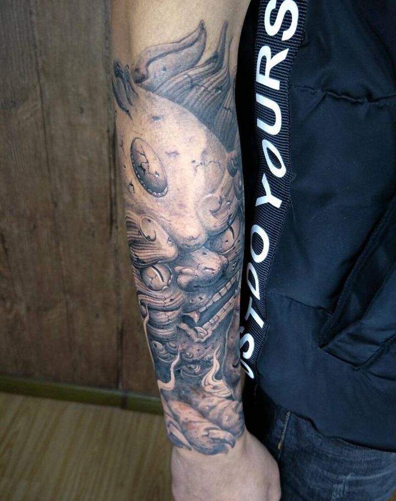 石裂，唐狮，佛纹身图片_手臂欧美写实成品纹身图案