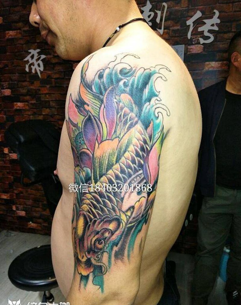 鱼鱼纹身图片_手臂传统动物成品纹身图案