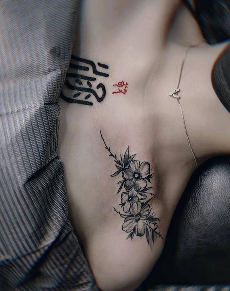 素花纹身图片_胸部点刺纹身图案