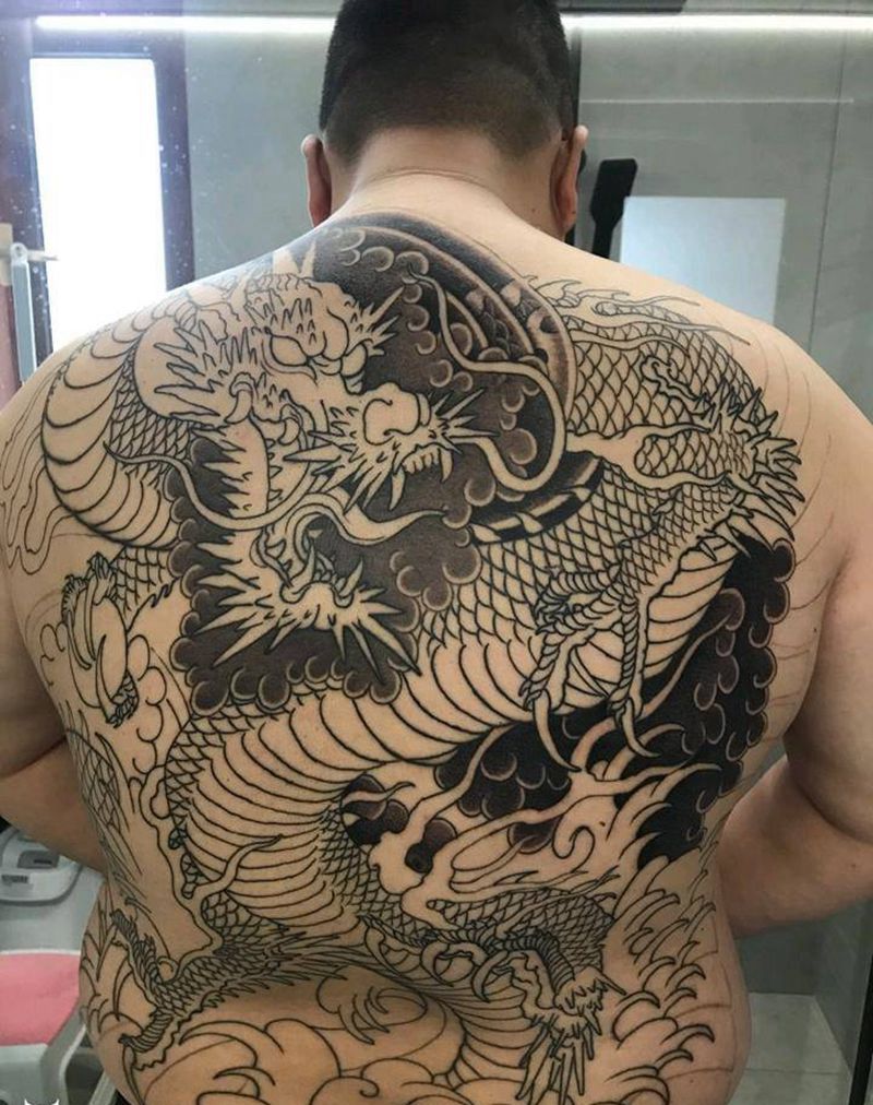 老传统龙未完待续纹身图片_背部老传统纹身图案