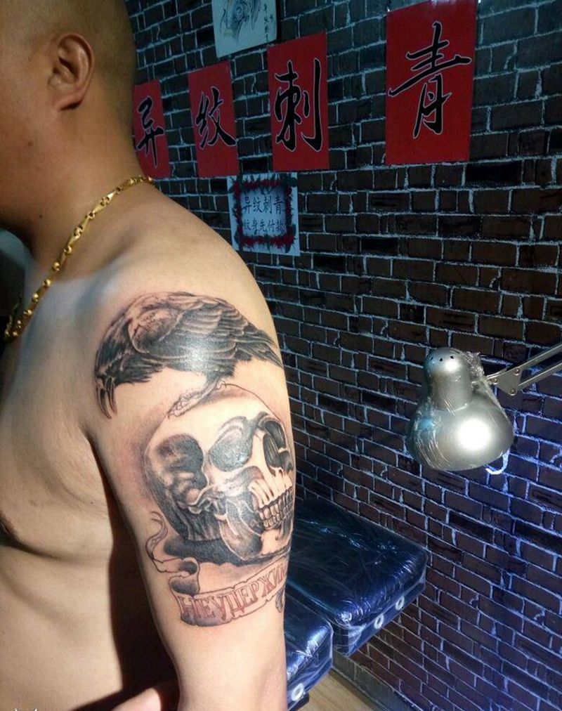 敢死队纹身图片_肩部欧美鬼神宗教纹身图案