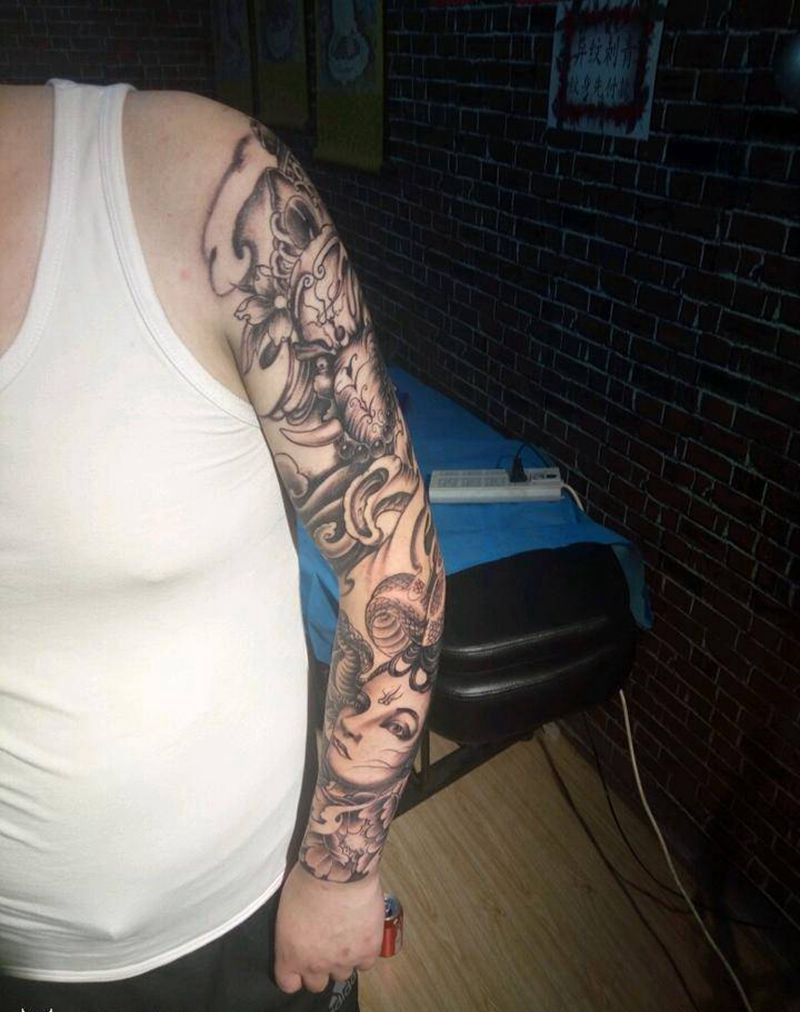 花臂纹身图片_手臂传统人物鬼神神话人物纹身图案