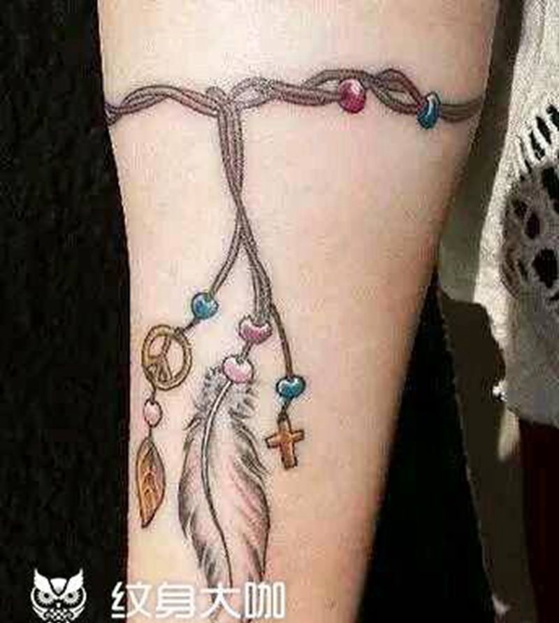 小羽毛脚链纹身图片