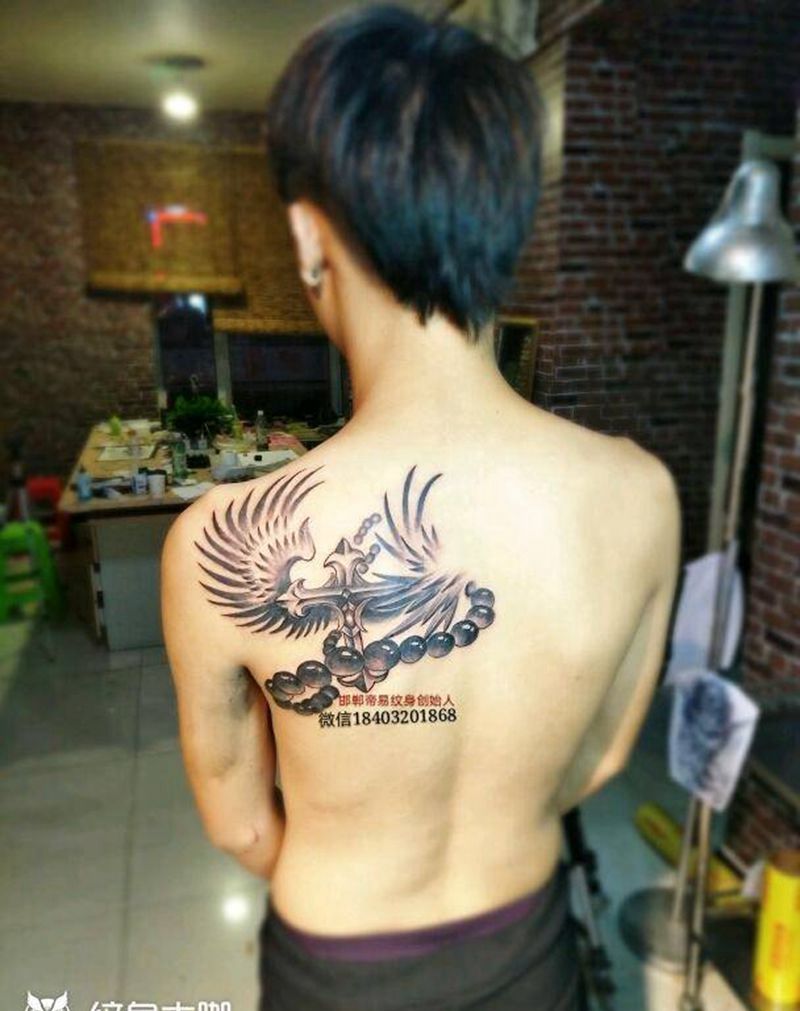 基督徒纹身图片_肩部背部欧美传统写实几何静物成品手稿纹身图案