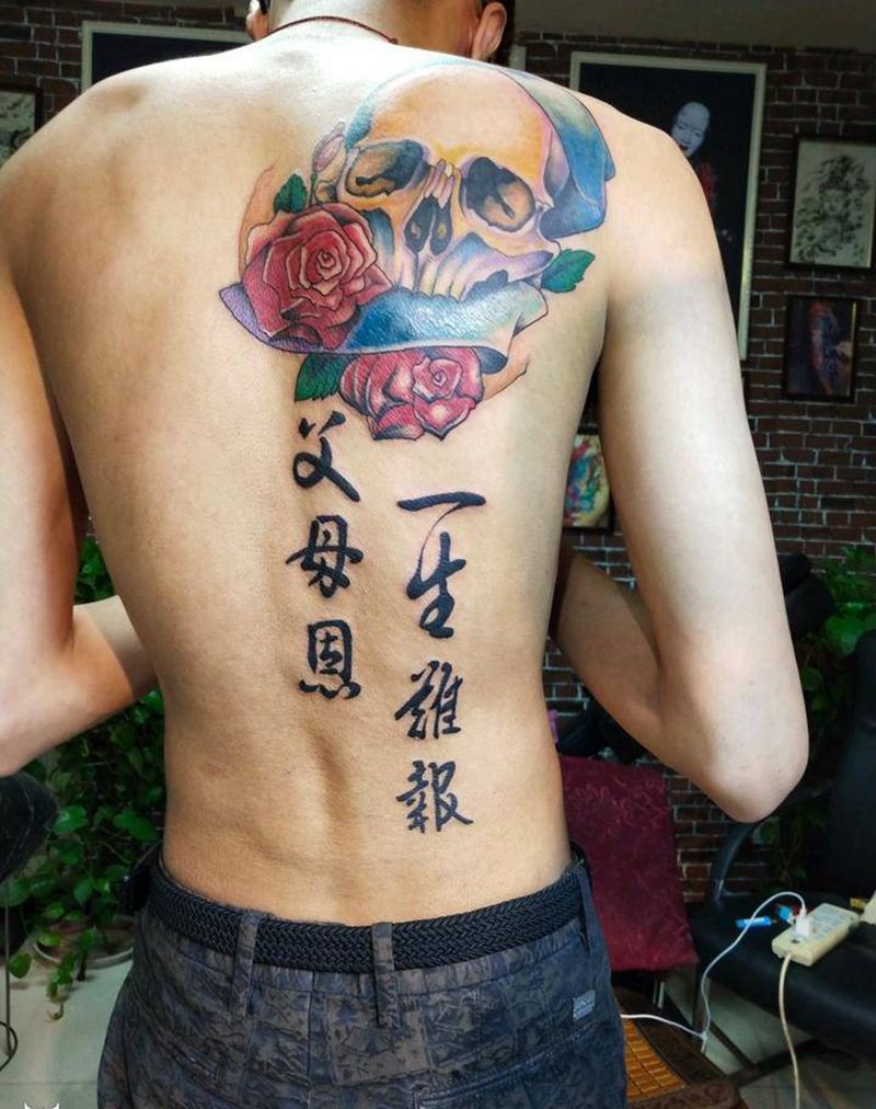 重生骷髅纹身图片_背部New School纹身图案