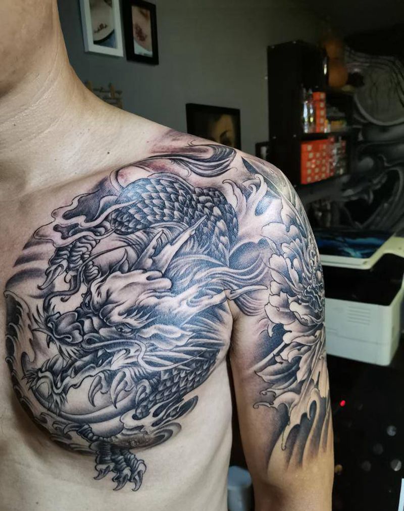 麒麟唐狮纹身图片_肩部手臂新传统纹身图案