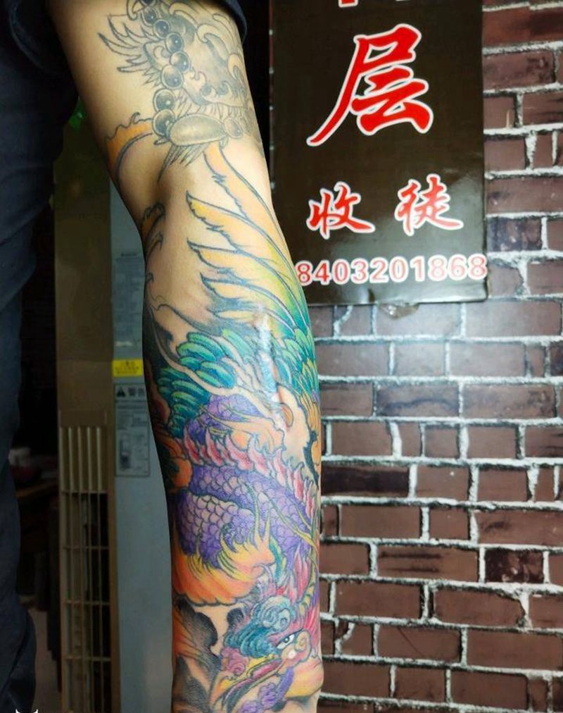 凤凰涅磐纹身图片_手臂新传统纹身图案