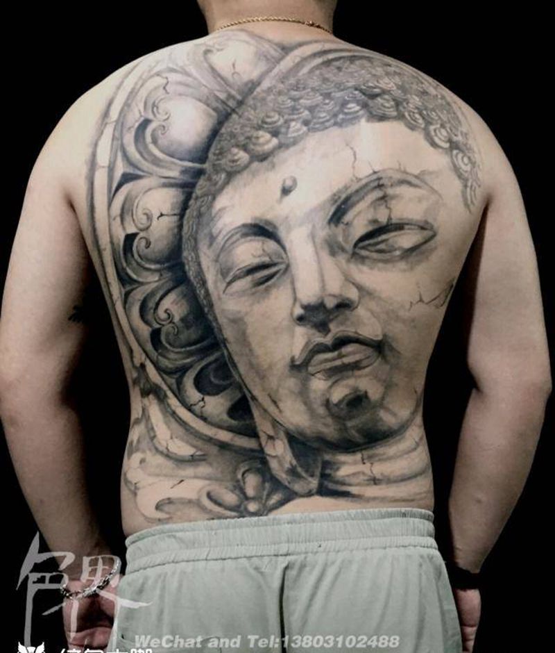 石雕佛纹身图片
