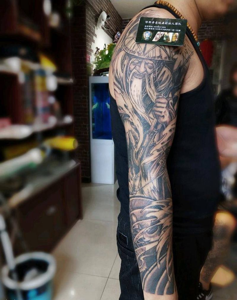 钓鱼老头纹身图片_手臂传统人物鬼神宗教成品纹身图案