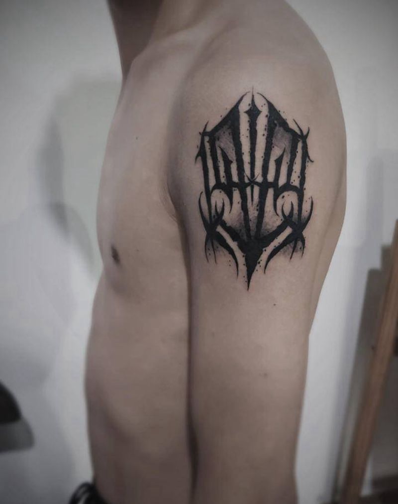 花体字纹身图片_手臂花体字纹身图案