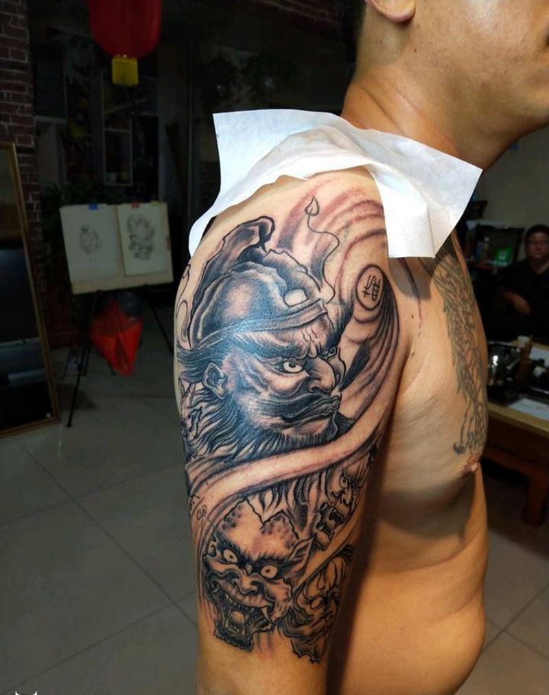 知道怎么叫赚钱吗？纹身图片_肩部手臂传统人物鬼神成品纹身图案