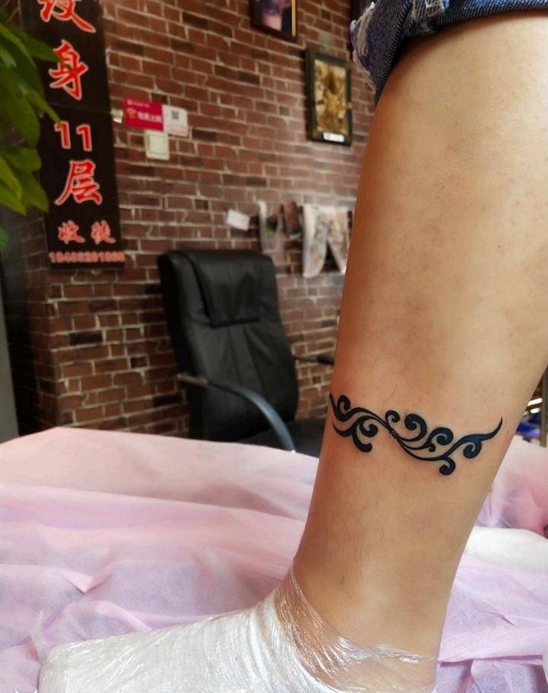 图腾花纹身图片_腿部图腾纹身图案