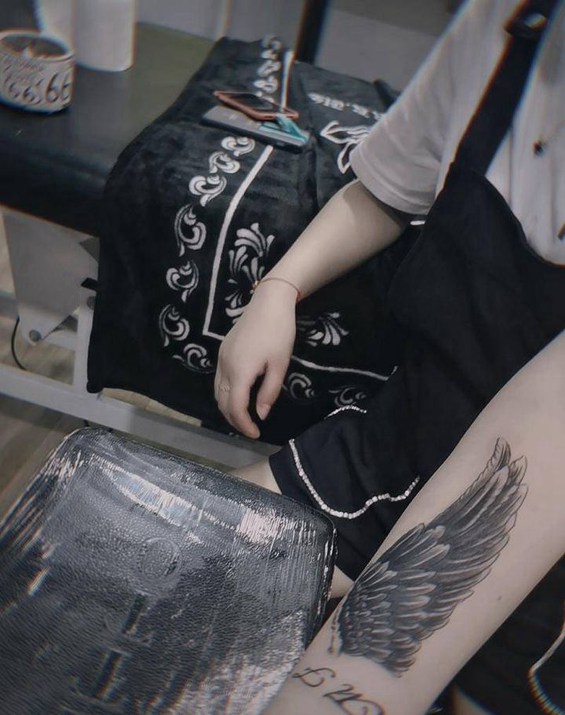 翅膀纹身图片_手臂欧美写实纹身图案