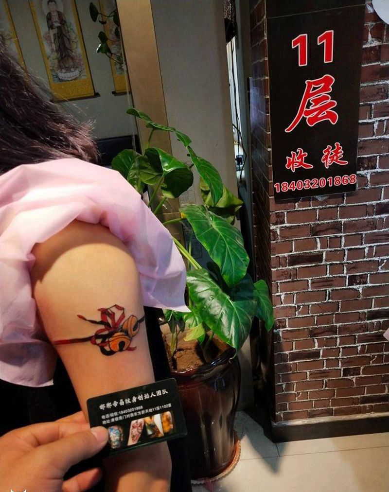 小玲铛纹身图片_手臂新传统纹身图案