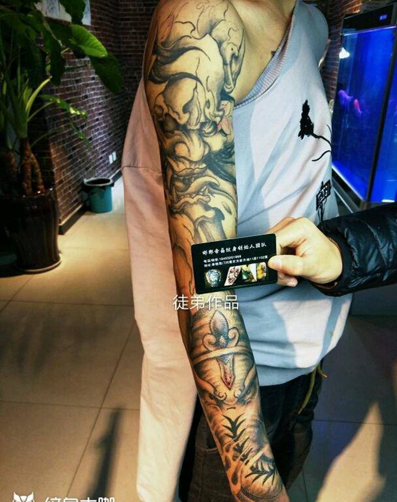 特价花臂纹身图片_肩部手臂手部传统几何动物成品纹身图案