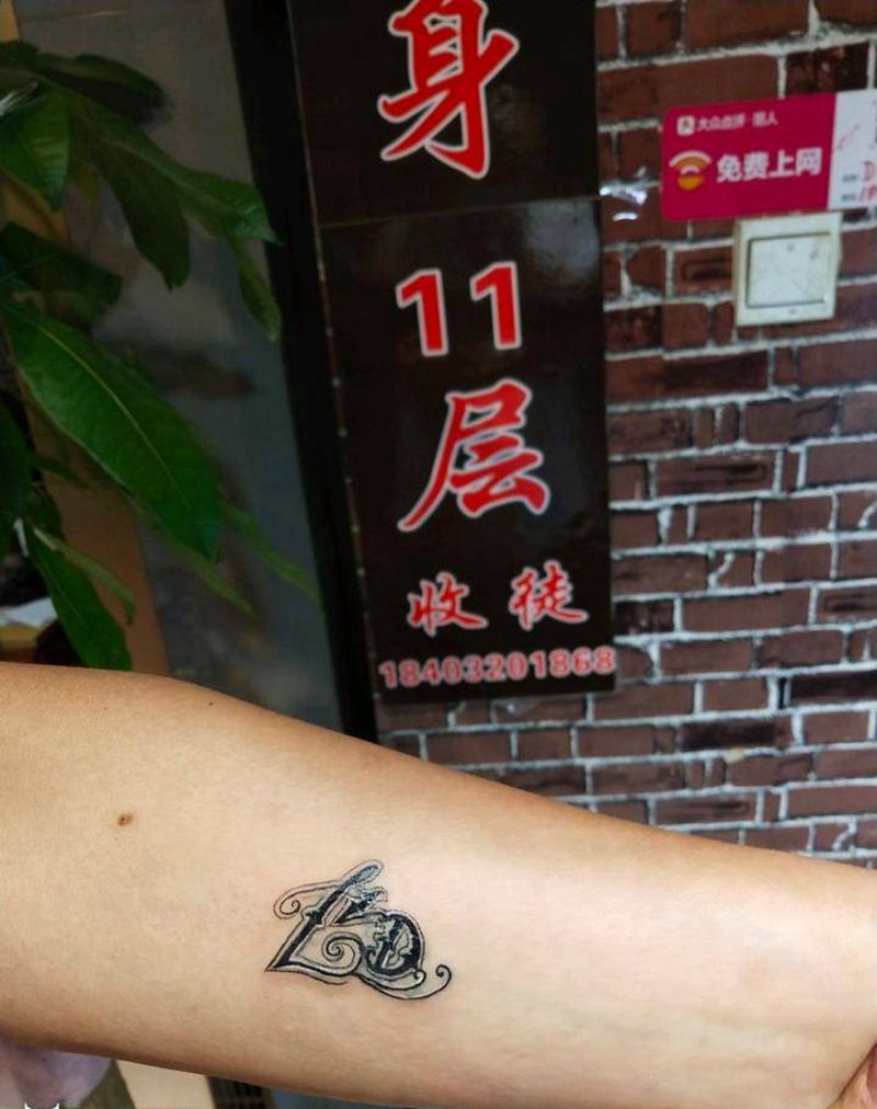 字母遮盖纹身图片_手臂纹身图案