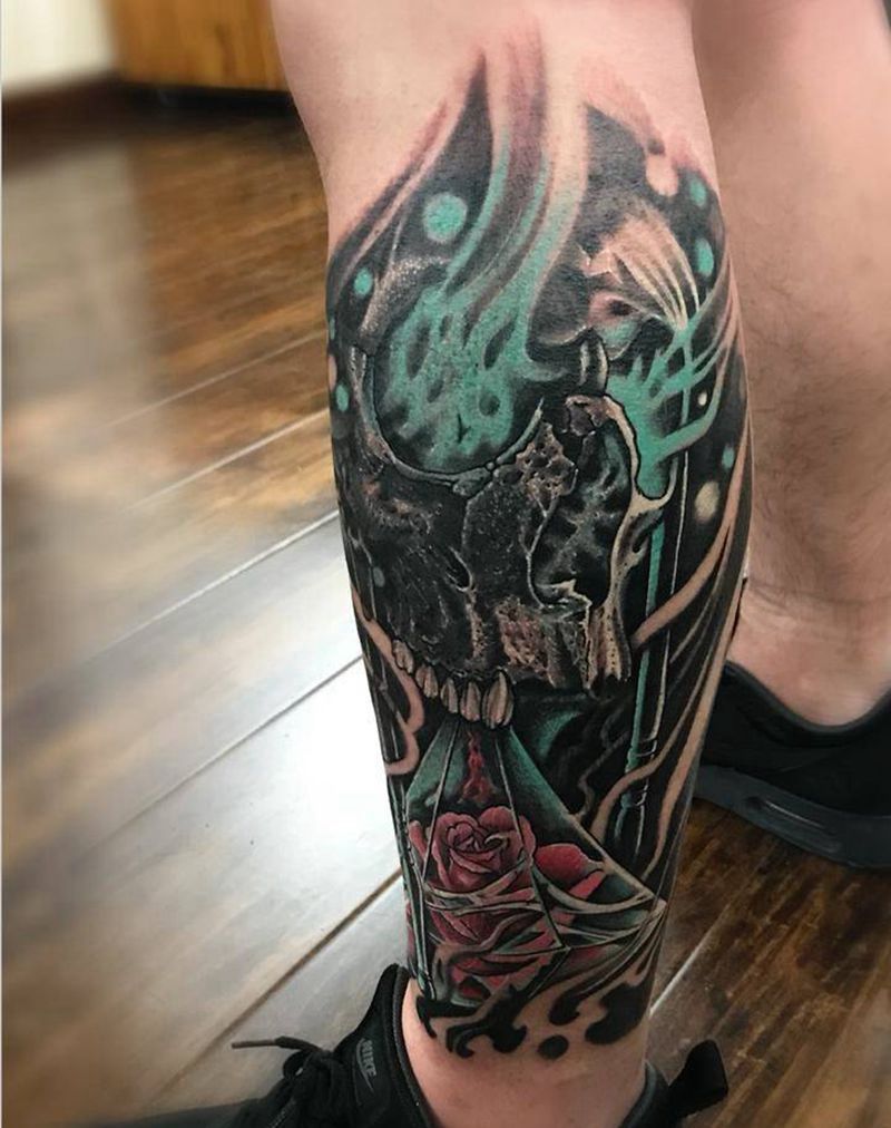 骷髅+玫瑰+钻石纹身图片