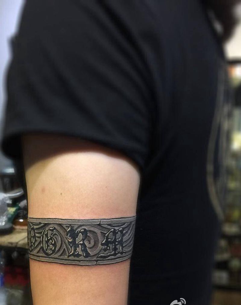 石雕臂环纹身图片_手臂欧美纹身图案