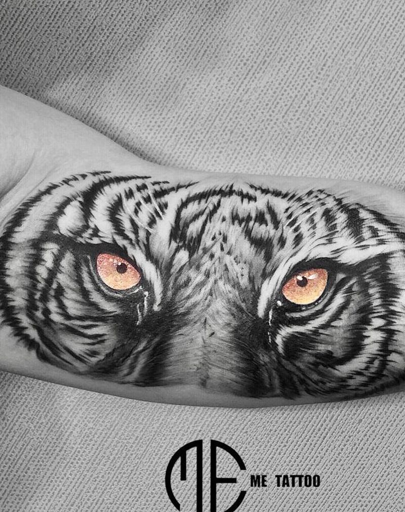 小老虎纹身图片_手臂欧美写实纹身图案