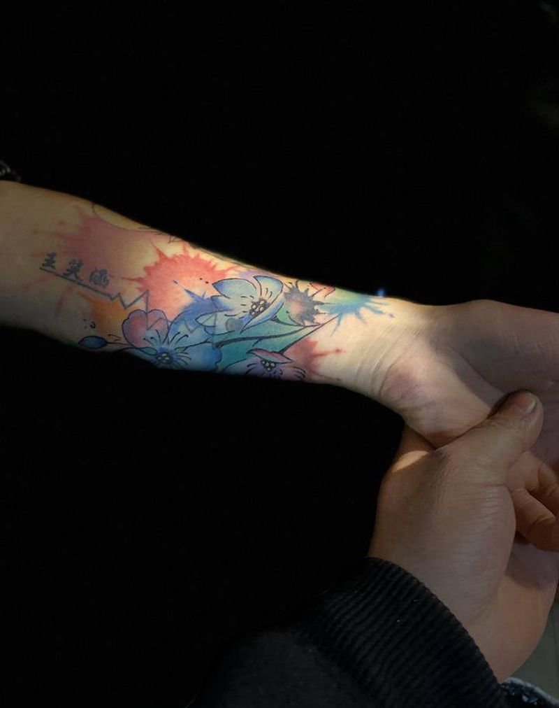 水彩花纹身图片_手臂水彩纹身图案