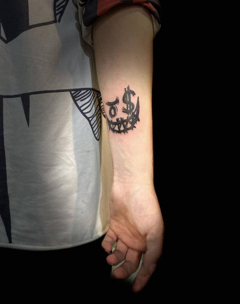 笑脸纹身图片_手臂图腾纹身图案