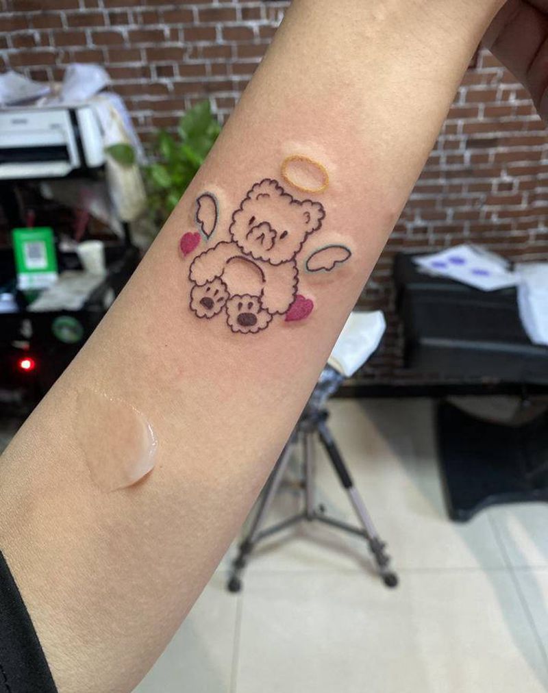 美女的小熊纹身图片_手臂New School纹身图案