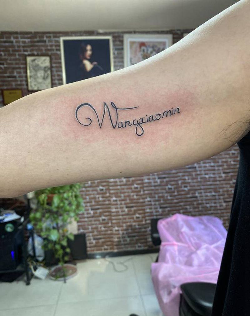 字母纹身图片_手臂花体字纹身图案