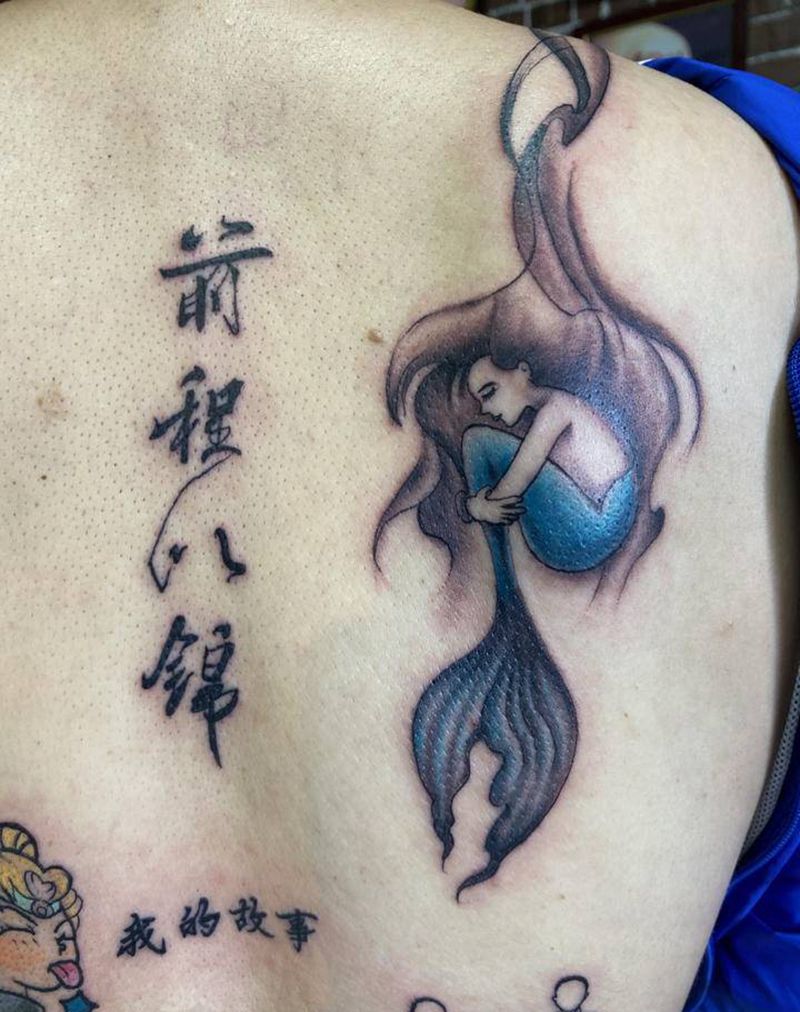 美女这个背纹身图片_背部欧美写实New School纹身图案