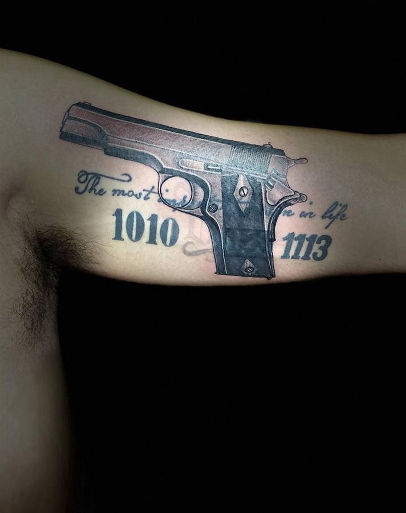 手枪1911纹身图片_手臂欧美写实纹身图案